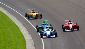 Race cars on Indy Speedway track